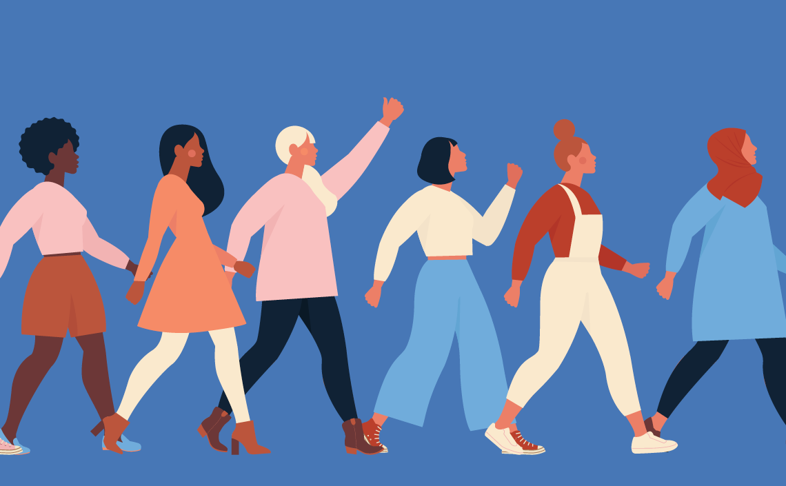 A diverse group of seven women walking together in a line, showcasing solidarity and empowerment, against a blue background.